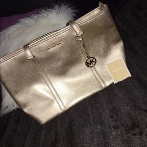 Michael Kors gold purse